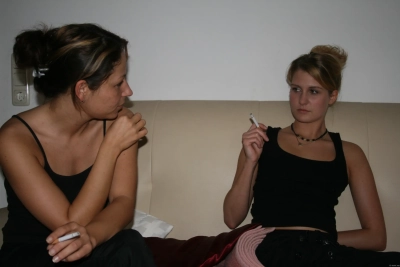 Two Women Sucking Cock: Explicit Amateur Porn Photo