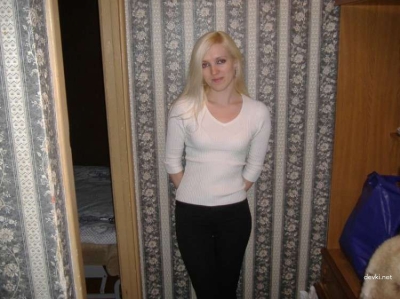 Explicit Blonde Amateur Photos: Private Shots of a Seductive Blond Woman