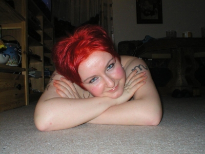 Redhead Amateur Girl Poses Naked in Explicit Porn Photos