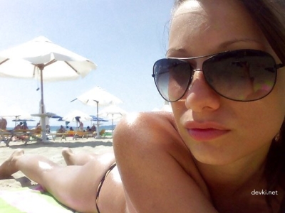 Hot Beach Babe Sunbathing - Amateur Photo of Girl Tanning